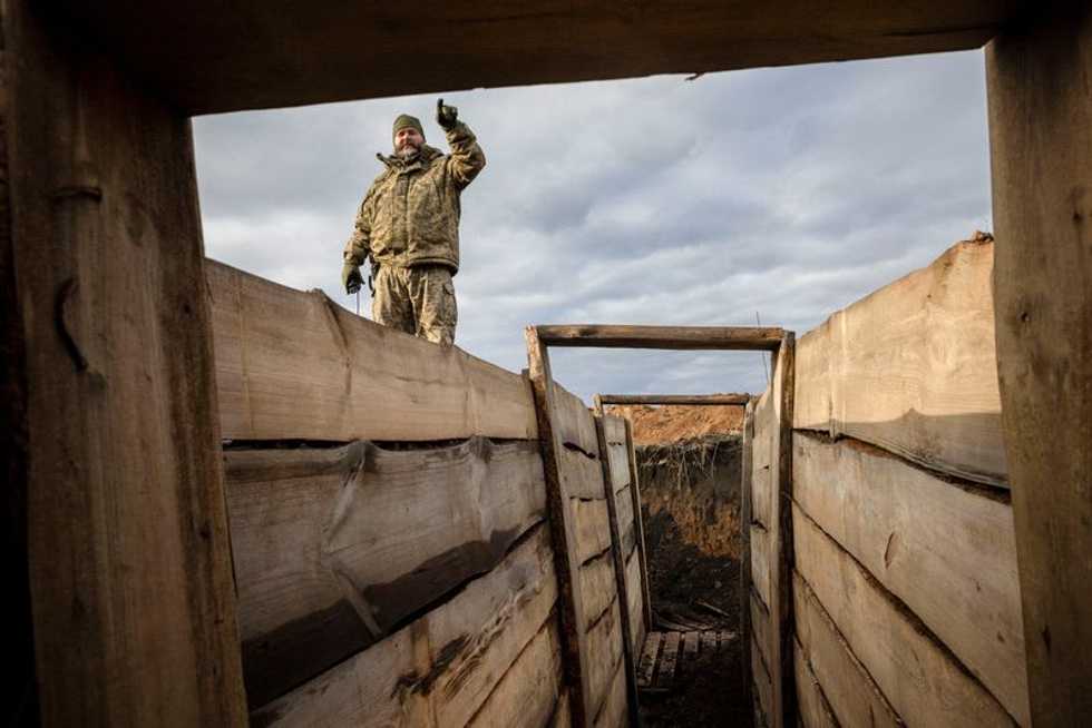Ukraine builds barricades, digs trenches as focus shifts to defense