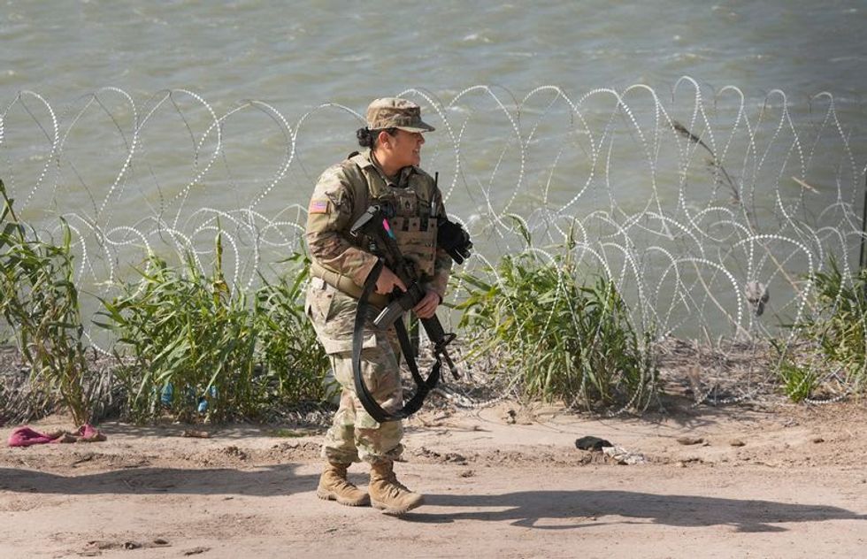 Texas erects new border barrier as dispute with Biden administration ramps up