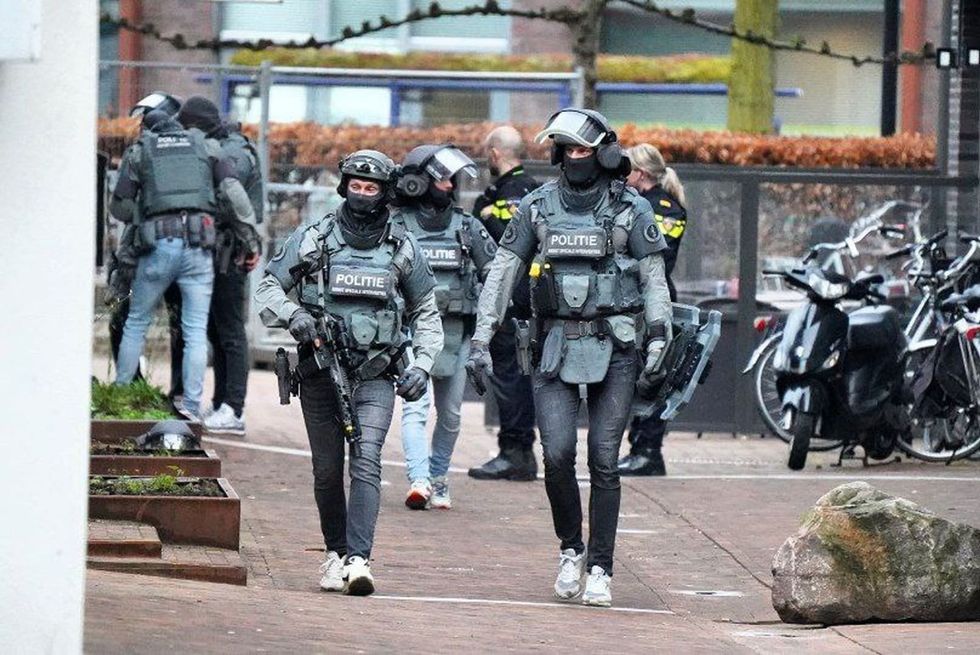 Several people leave Dutch cafe amid hostage drama