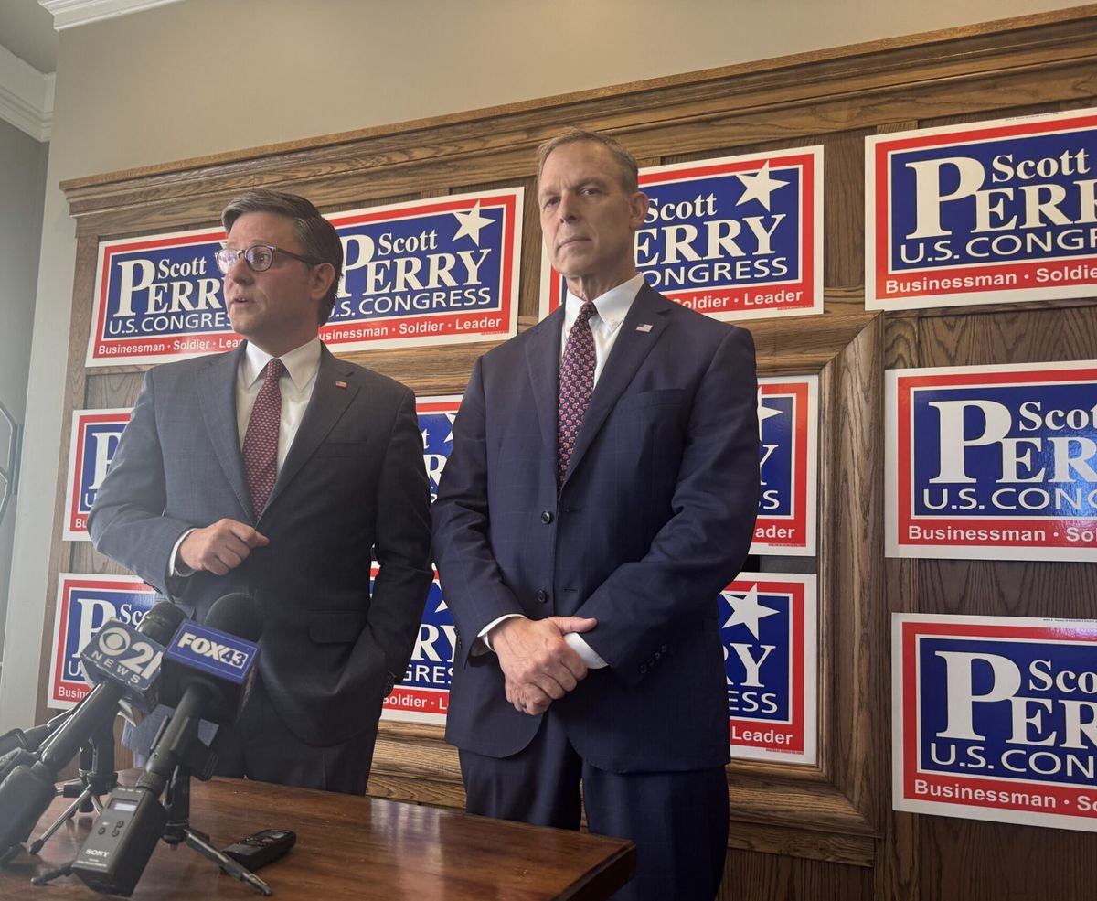 Mike Johnson stumps for Scott Perry as he slips in polls