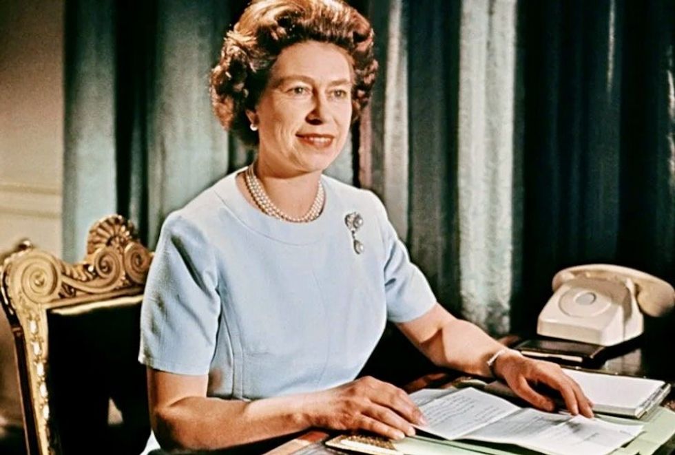 Queen was not told aide was Soviet spy for years, UK records show