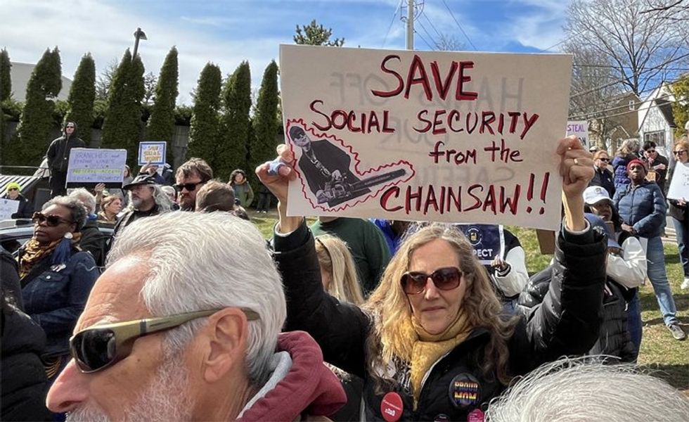 GOP lawmaker caught on video faking call instead of answering about Social Security cuts