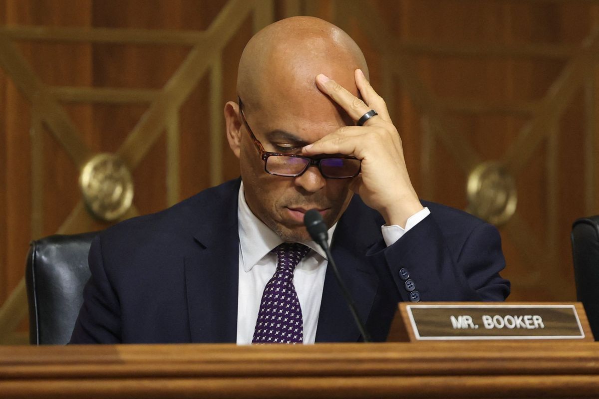 'Explain!' Shocked critics demand to know why Cory Booker confirmed Jared Kushner's dad
