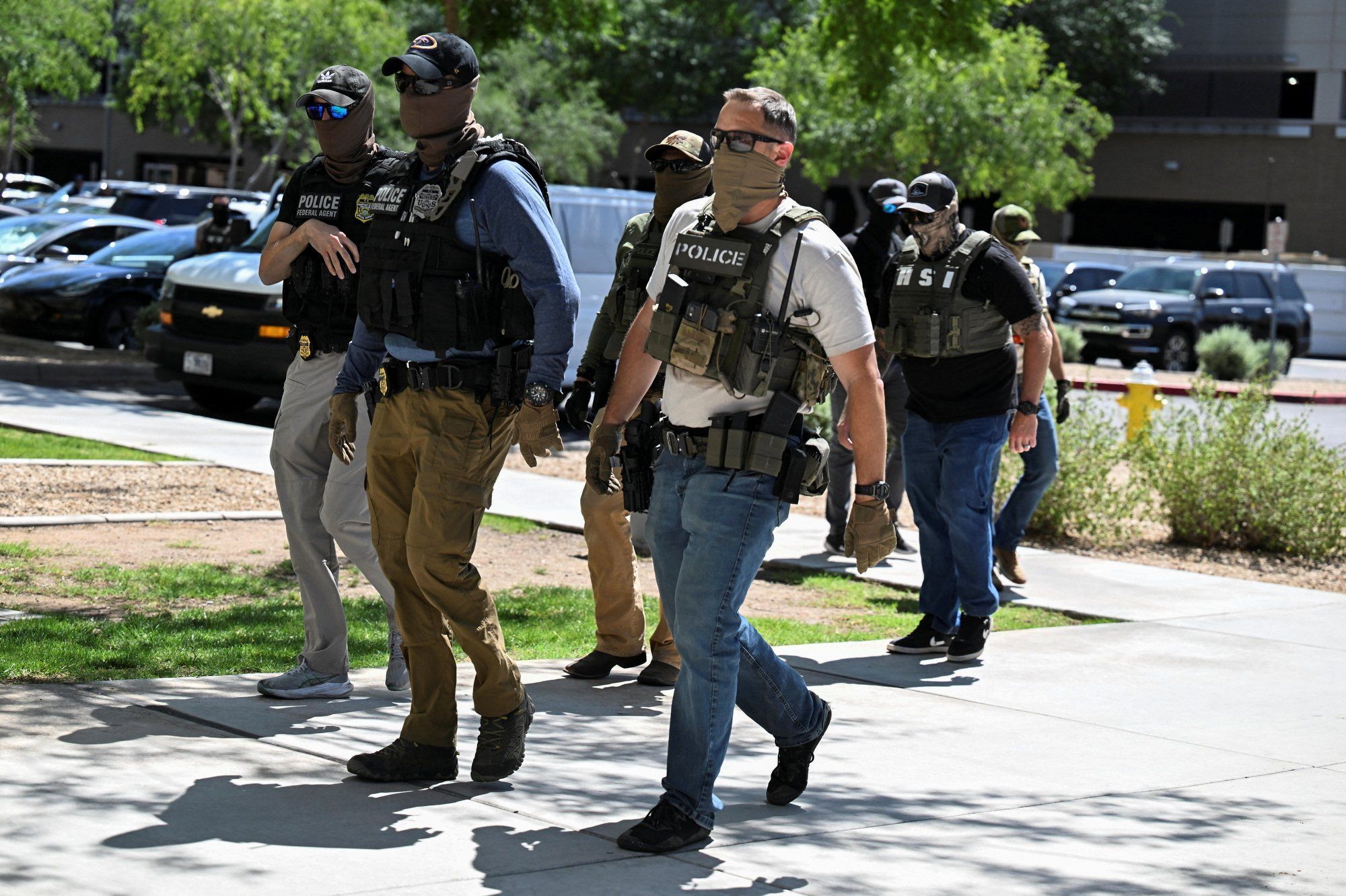 ICE officers in masks
