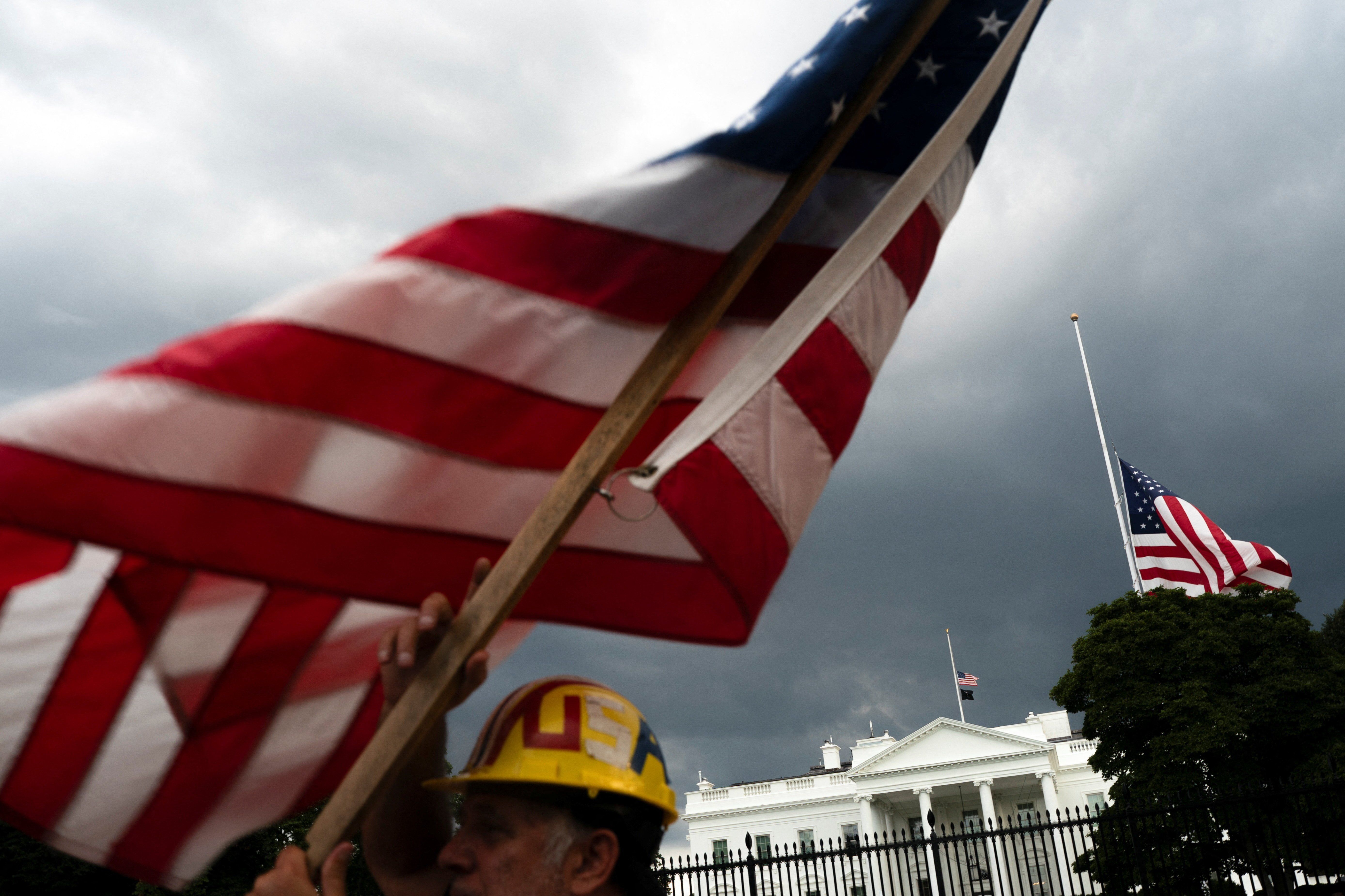 White House Trump supporter waves flag