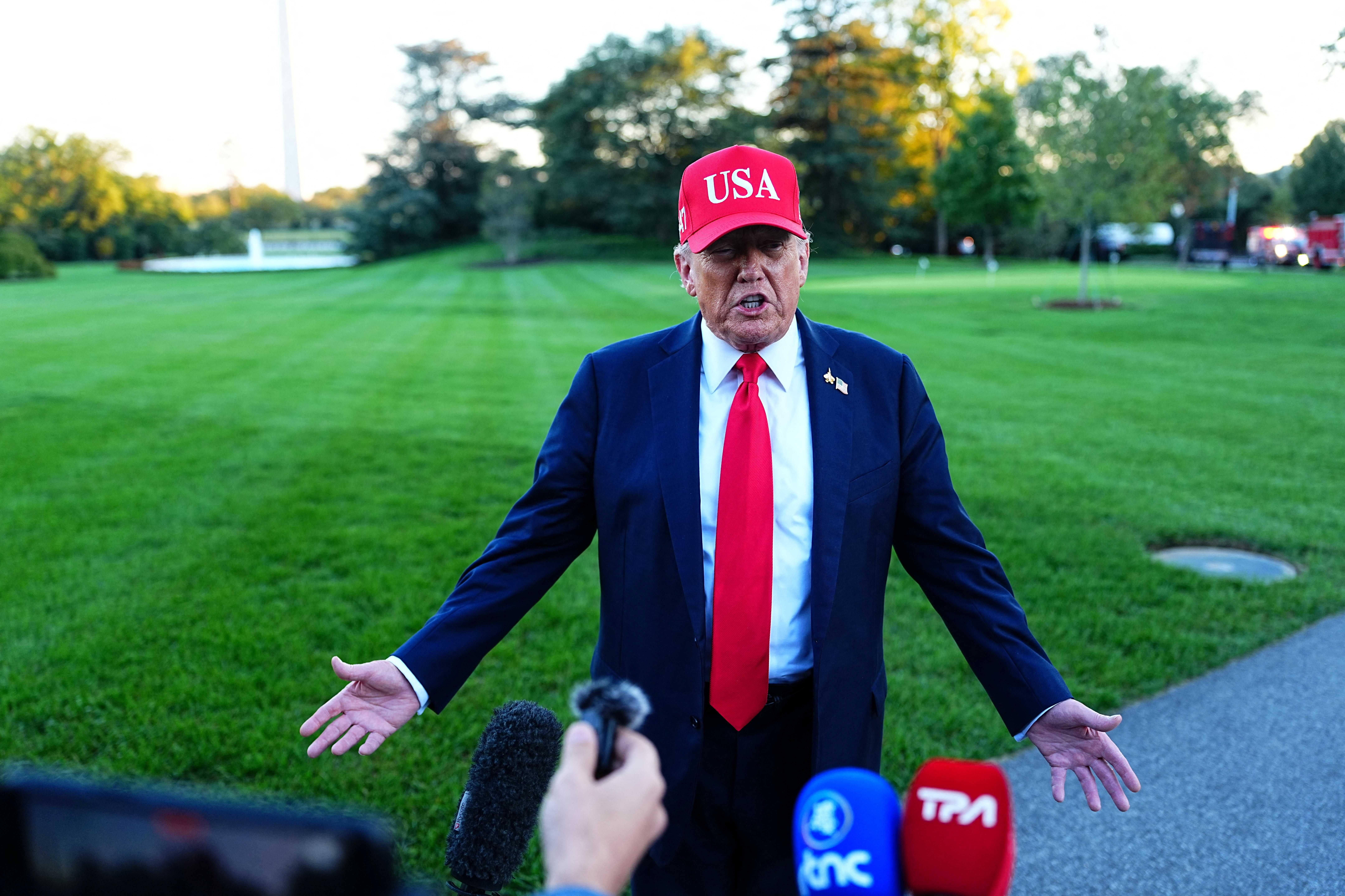 Donald Trump speaks to the media