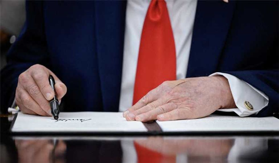 White House on defense after under-the-radar Trump memo sets off firestorm