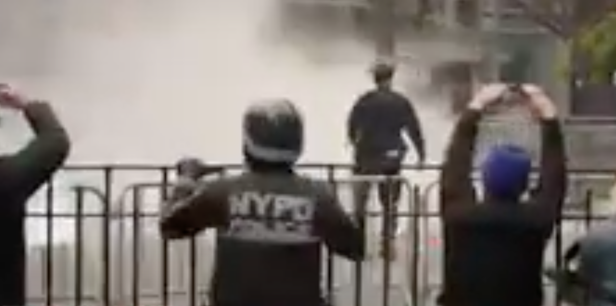 Papers thrown by self-immolator had 'vast conspiracy theories' written on them: MSNBC