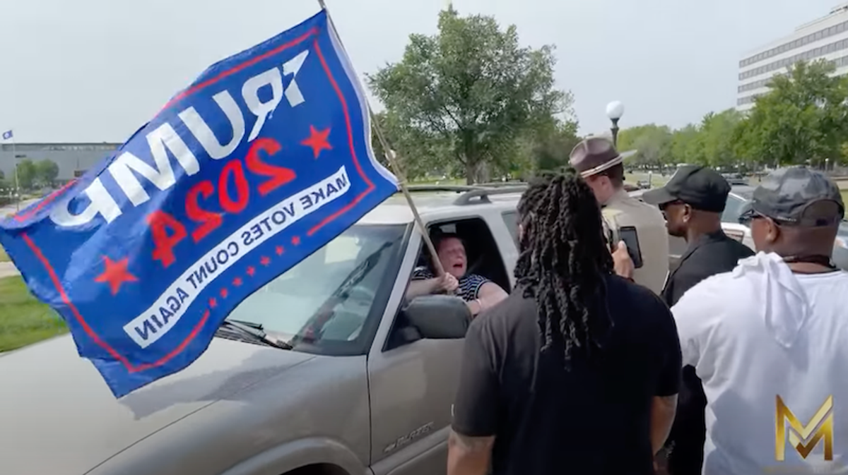 WATCH: 'Dangerous' woman waving Trump flag drives onto mall of Minnesota Capitol — and police don't arrest her