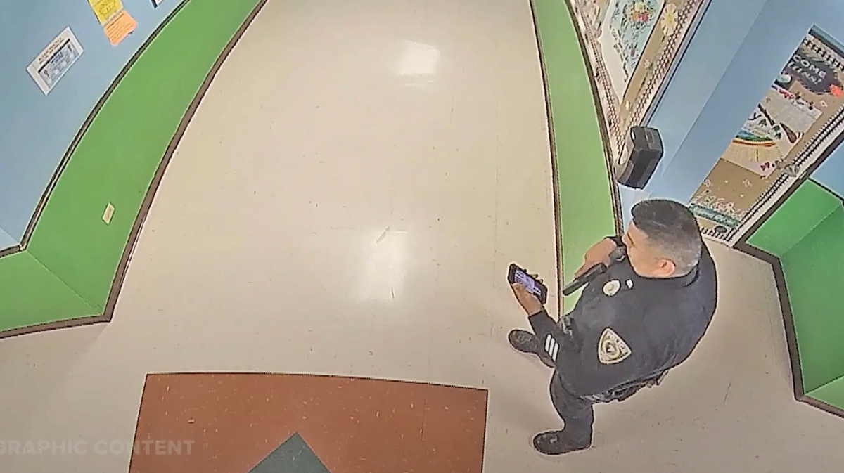 Uvalde police officer criticized for checking his phone was waiting to hear from his dying wife