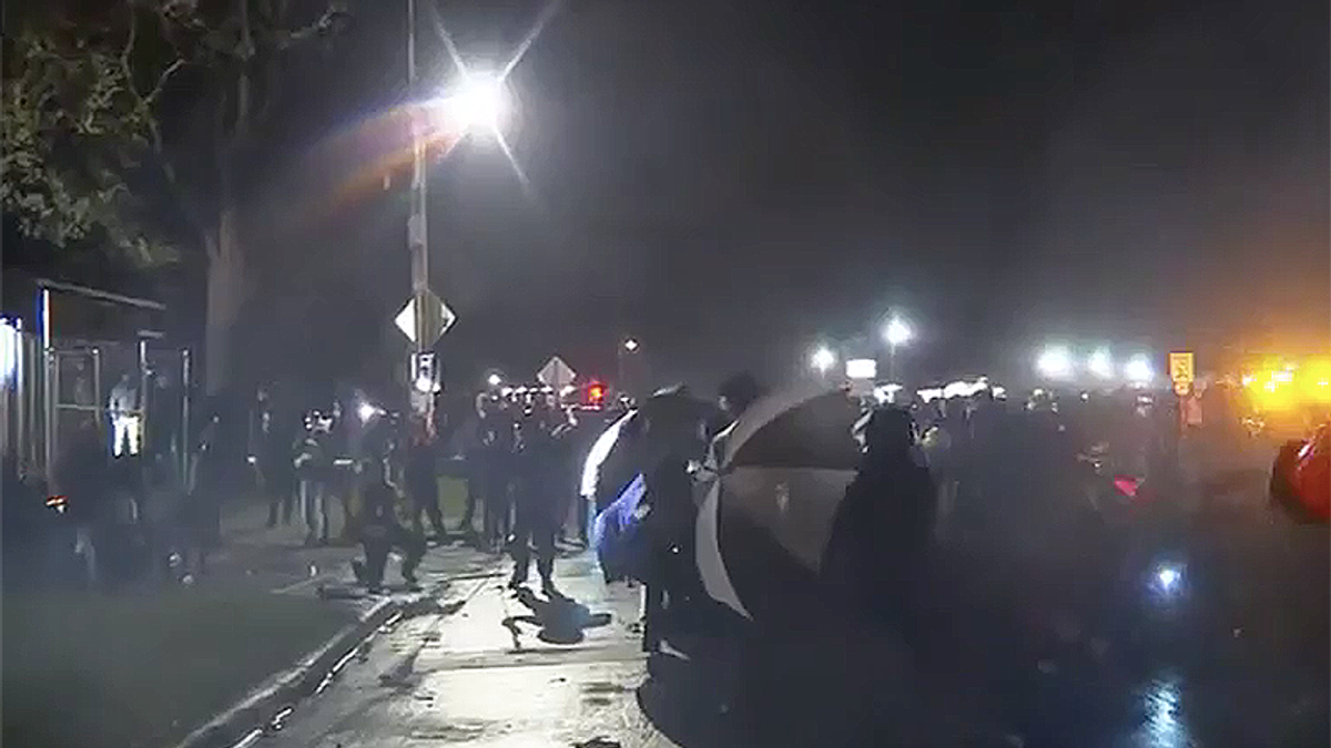 Brooklyn Center police throw flashbangs at kneeling protest crowd an hour before curfew