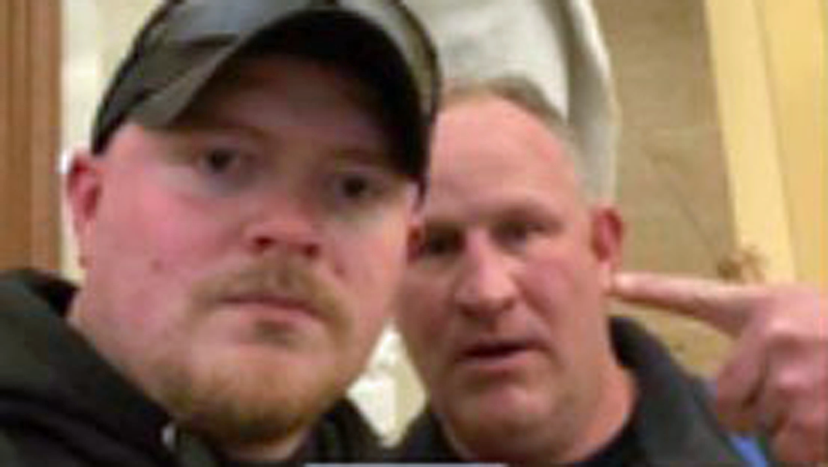 Virginia cops hit with federal charges after taking selfie during insurrection: report
