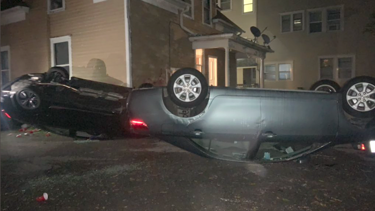 WATCH: Protesters storm frat house over rape allegations -- flipping over cars and breaking down the door