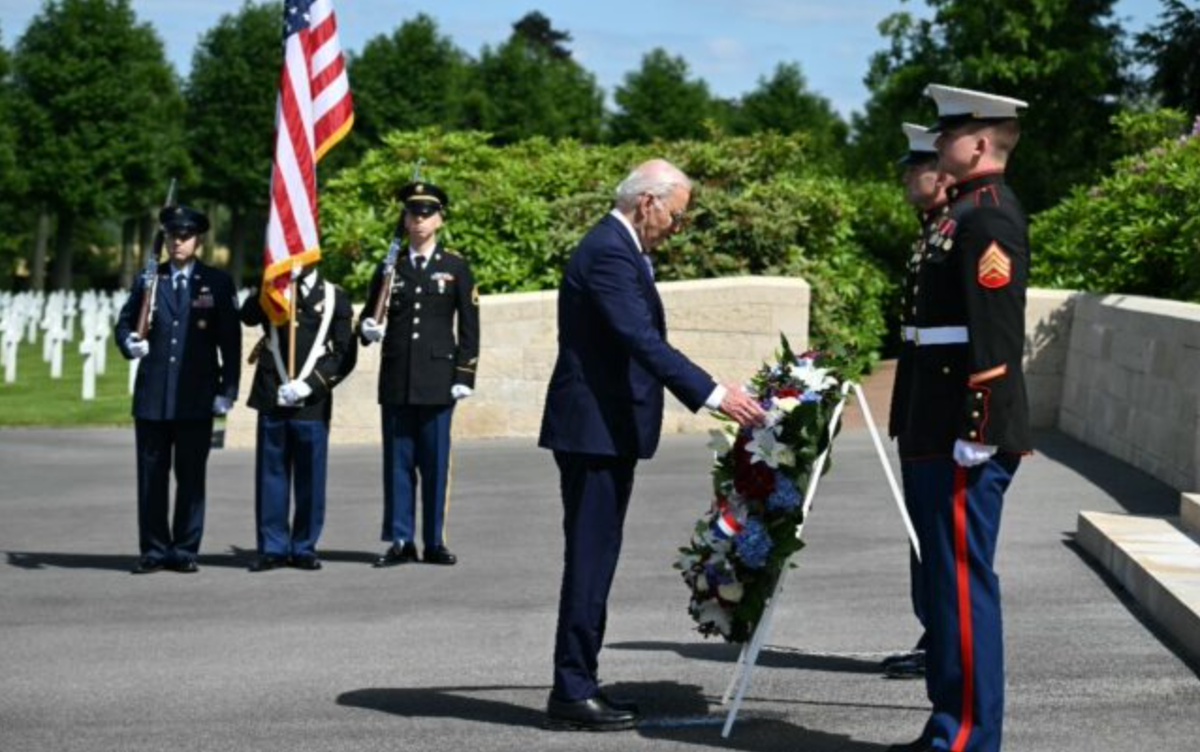 Biden visits WWI cemetery in France in rebuke to Trump