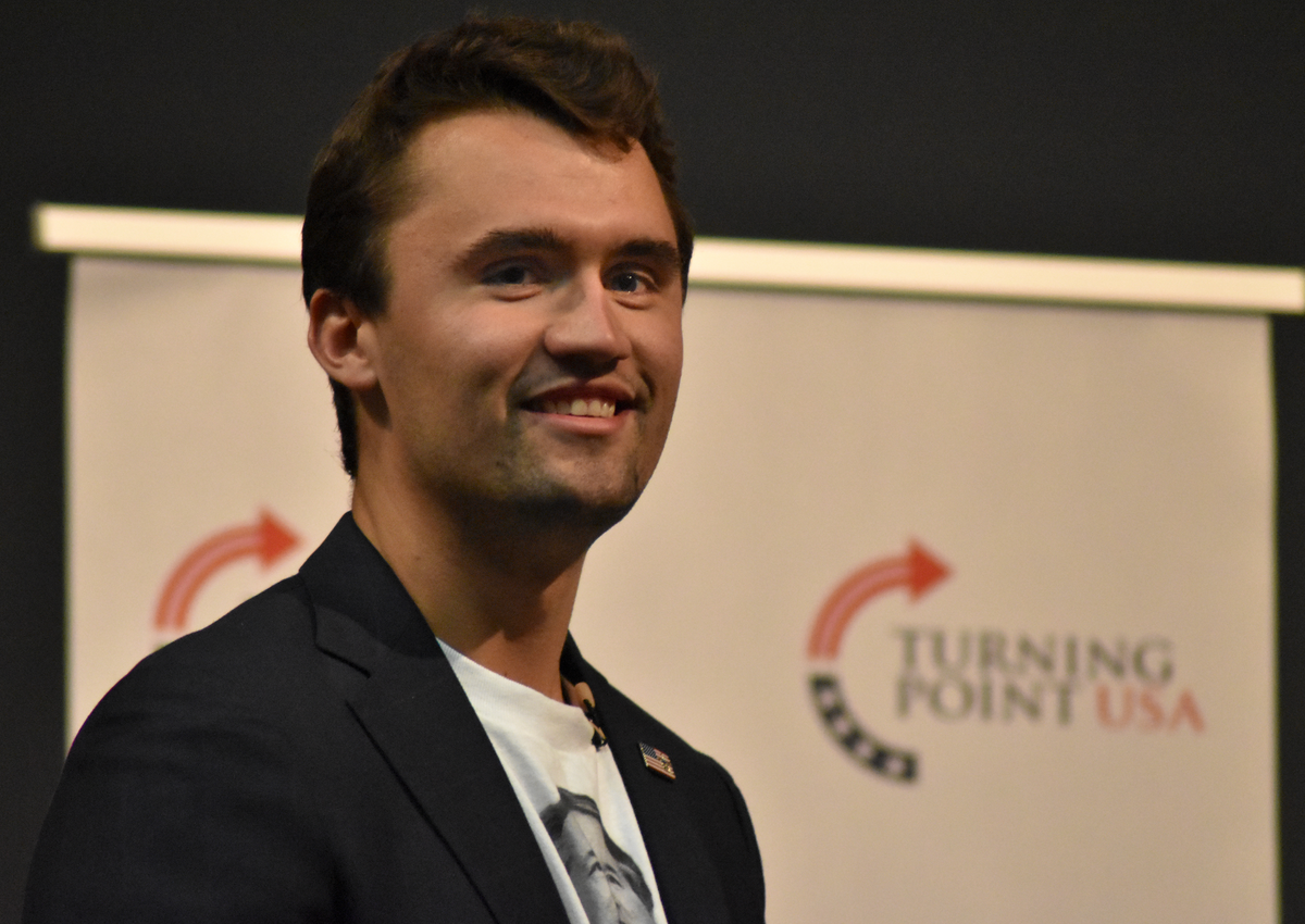 Turning Point USA conference-goers yell hate slurs at Black and gay GOPer: video