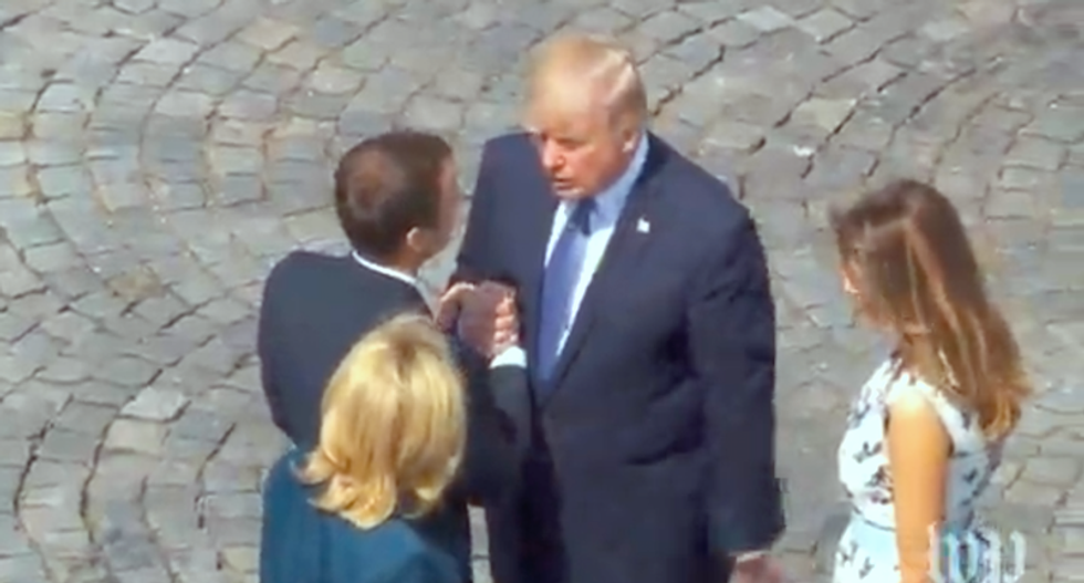 WATCH: Trump and Macron exchange words during lengthy and bizarre handshake