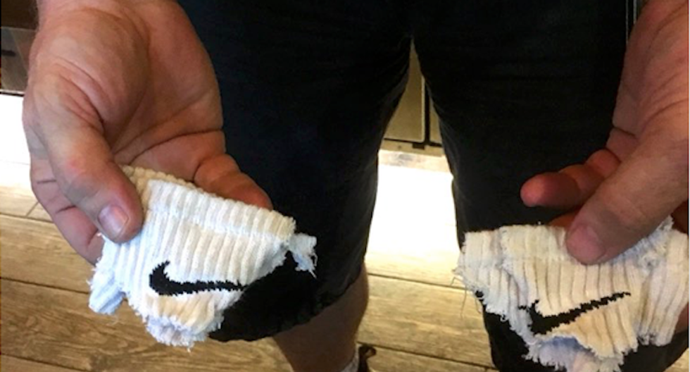 Conservative hilariously mocked after he ruins his own Nike socks to protest Kaepernick