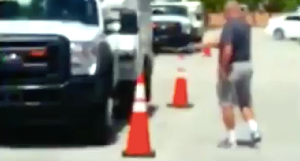 WATCH: Florida gun nut shoots up utility trucks after workers ignore his demands to move