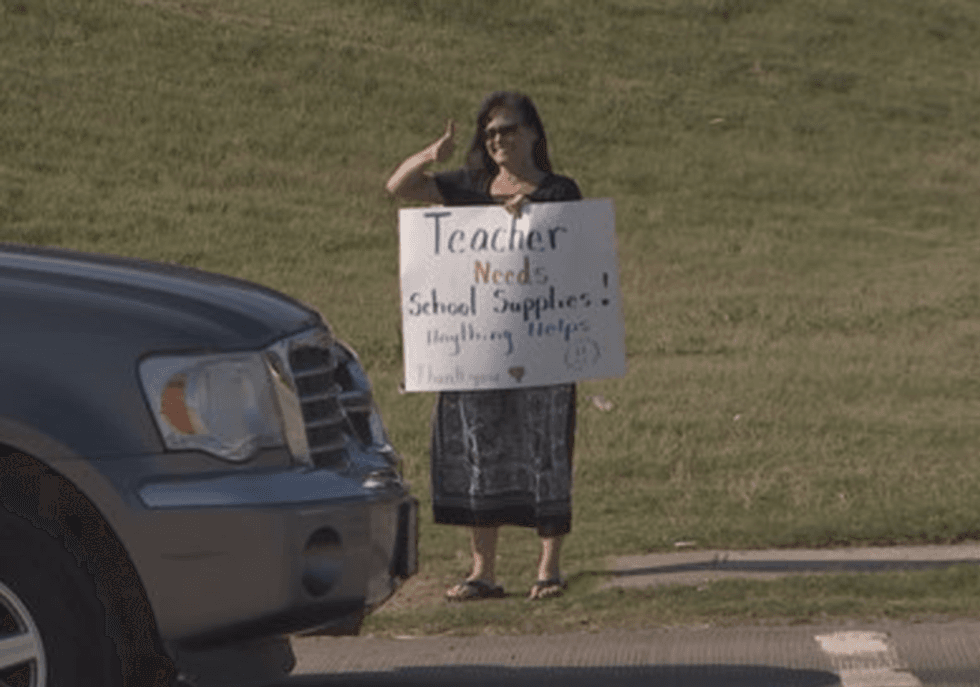 Oklahoma teacher reduced to panhandling for supplies as GOP cuts ravage school budget