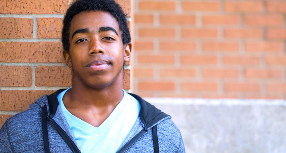 Refs punish black soccer players after they complained about racist abuse