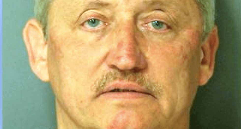 White man arrested alive after pointing shotgun at passing cars and shooting handgun at deputy