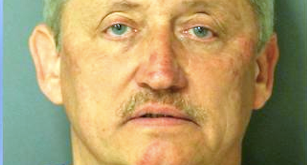 White man arrested alive after pointing shotgun at passing cars and shooting handgun at deputy