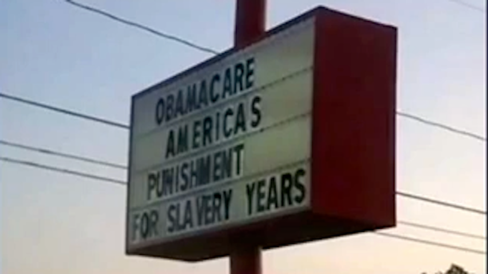 Arkansas rib shack sign says Obamacare is America's punishment for slavery