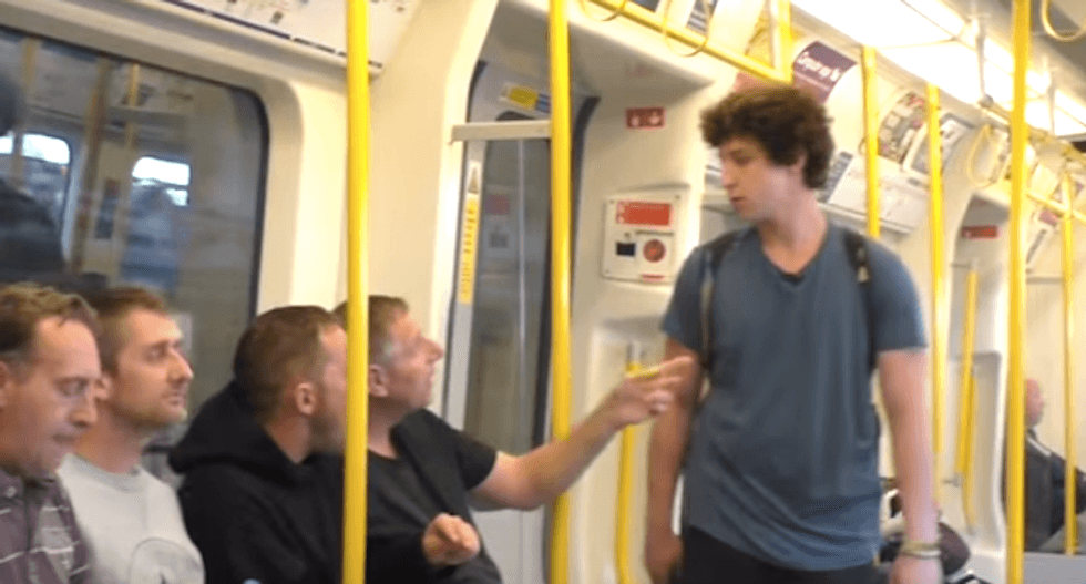 ‘I’ll throw you off the train’: Watch commuters stand up to homophobia in amazing social experiment