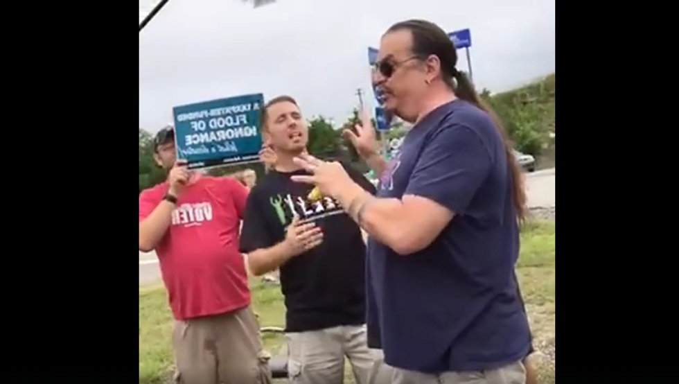 WATCH: Creationist debates an atheist on evolution outside Ark museum -- and gets utterly humiliated