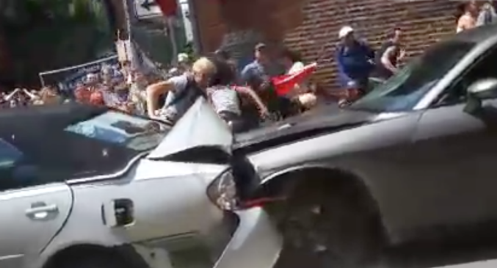 WATCH: One dead, 19 injured after car plows through crowd at Charlottesville protest