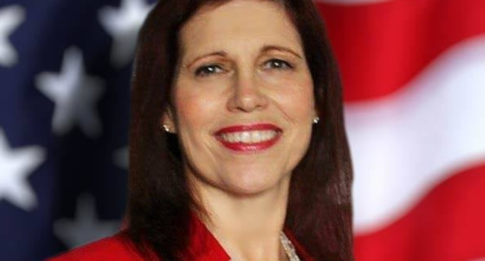 GOP candidate was ‘physically in tears’ after her campaign denied she was a QAnon believer