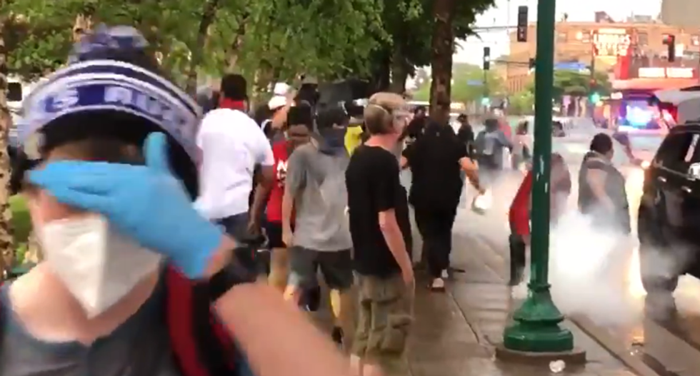 WATCH: Protesters tear-gassed by cops while protesting police killing of George Floyd