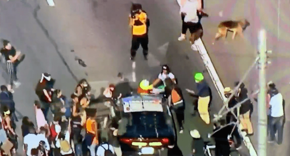 LAPD declares George Floyd protest an ‘unlawful assembly’ after multiple cop cars damaged