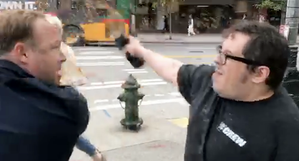 WATCH: Seattle local dumps hot coffee on ranting Alex Jones