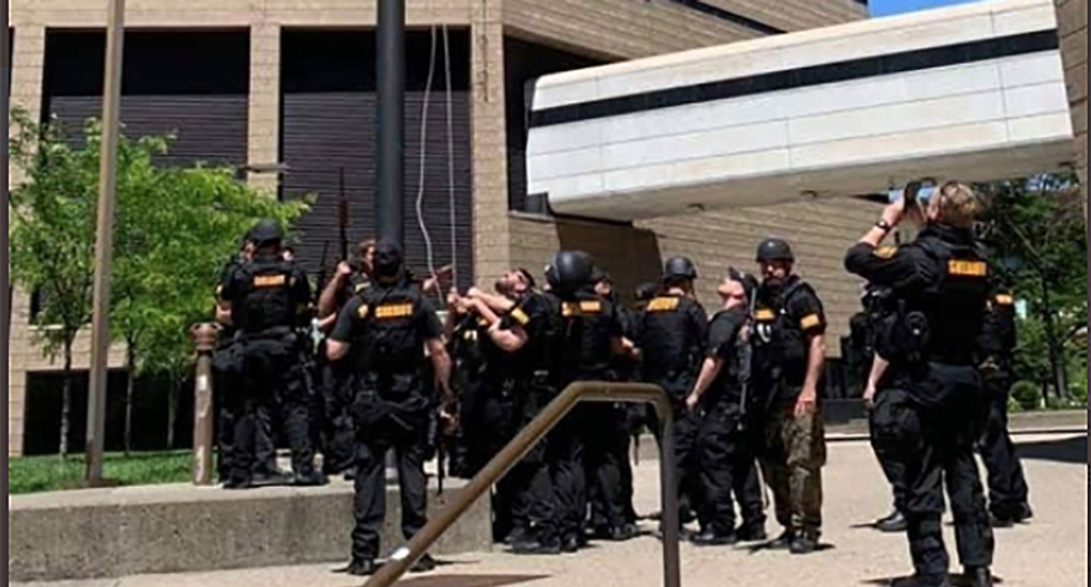 Cincinnati sheriff deputies replace American flag at the Justice Center with 'thin-blue-line' flag