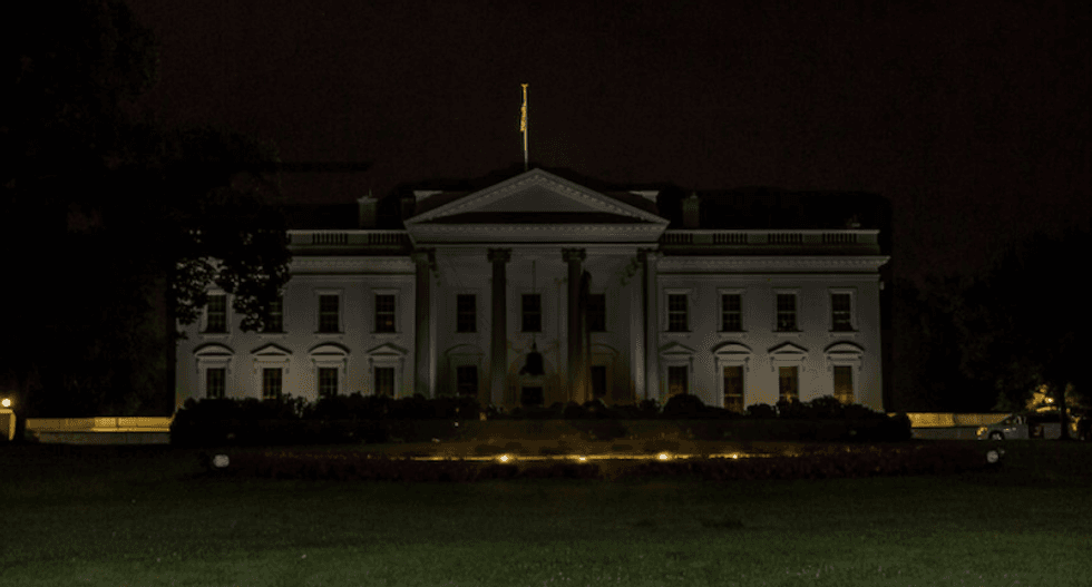 Trump drowned in scorn for turning off White House lights as if he 'ran out of Snickers' on Halloween