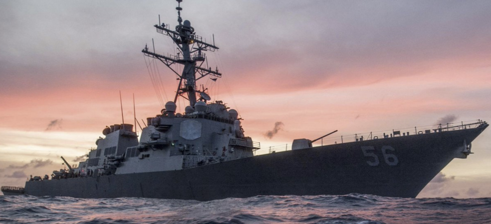 Navy Destroyer USS John McCain collides with merchant vessel off Malaysian coast