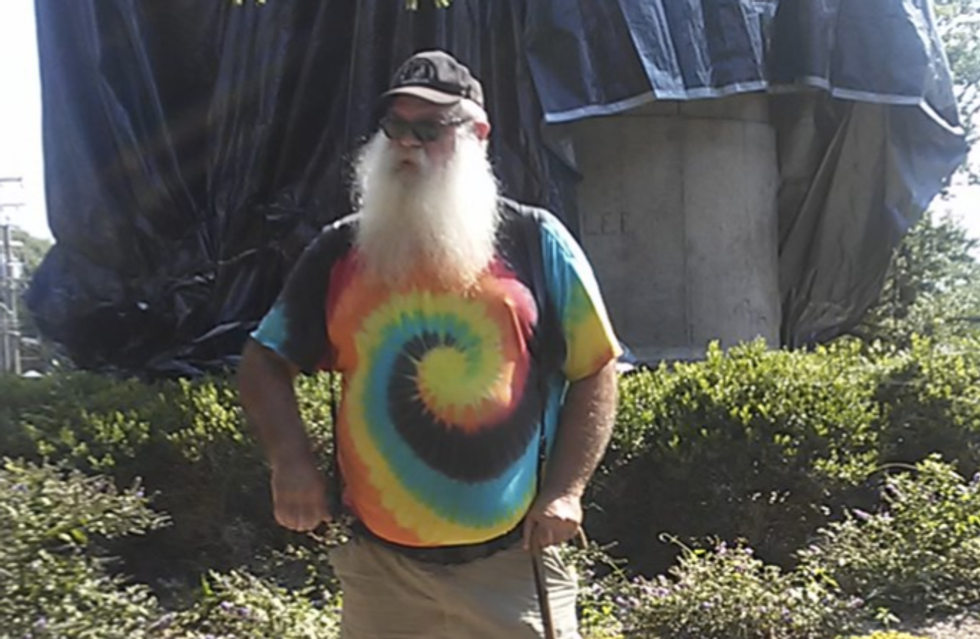 Armed man slashes tarp on Charlottesville monument and says Heather Heyer died 'playing in traffic'