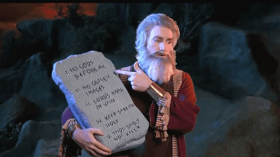 Colbert writer dresses like Moses to issue an epic rebuke of Pat Robertson putting money over murder