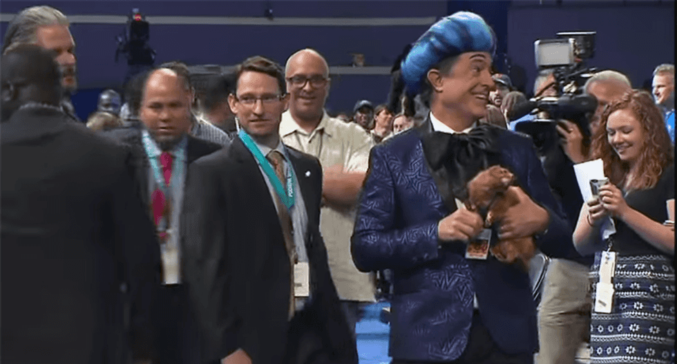 'I'm with her!': Stephen Colbert hilariously tries to get onstage at the DNC