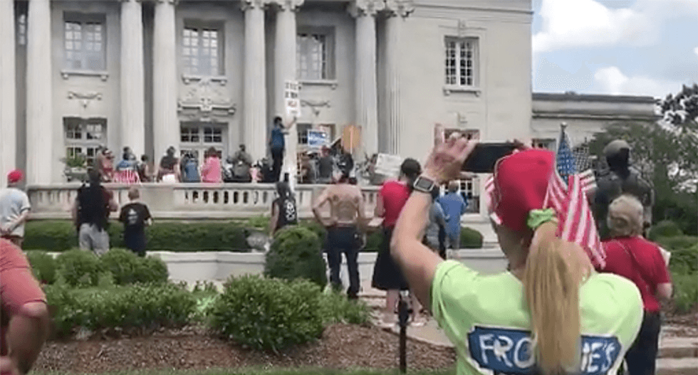 Second Amendment protesters marched to Kentucky governor -- and demanded he face them before hanging him in effigy