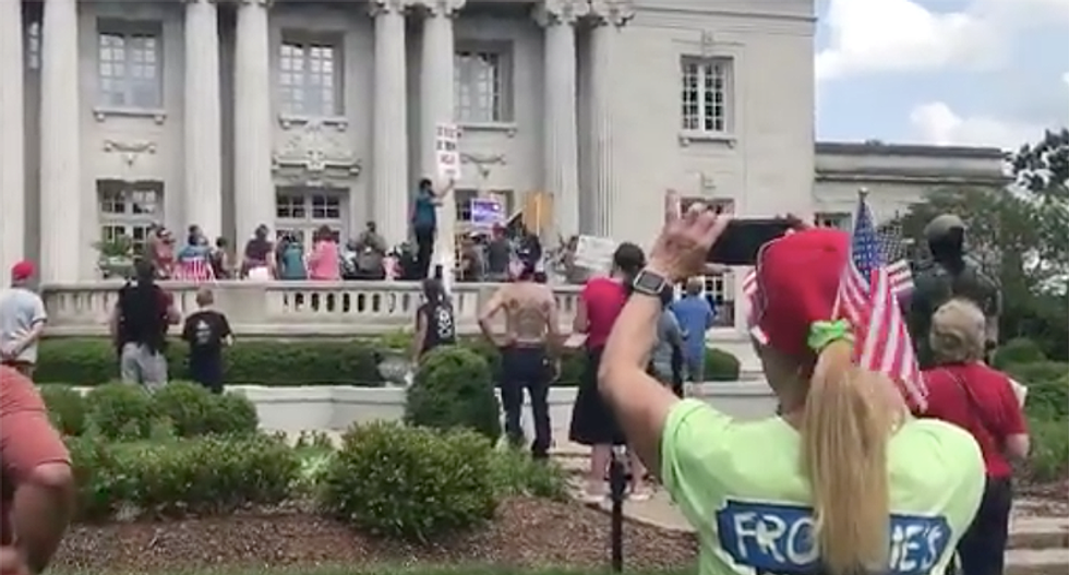 Second Amendment protesters marched to Kentucky governor -- and demanded he face them before hanging him in effigy