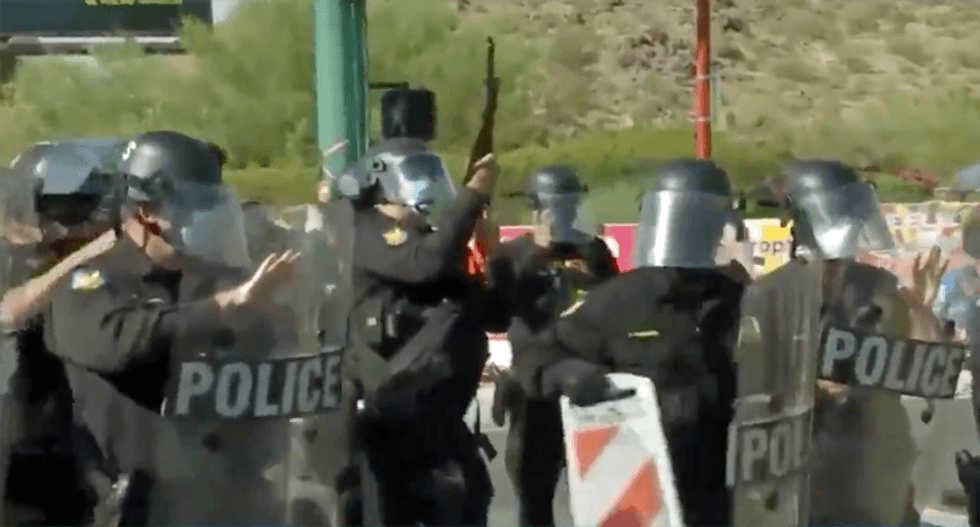 Police used pepper spray and flash-bang grenades on protesters outside Trump's controversial Phoenix rally: report