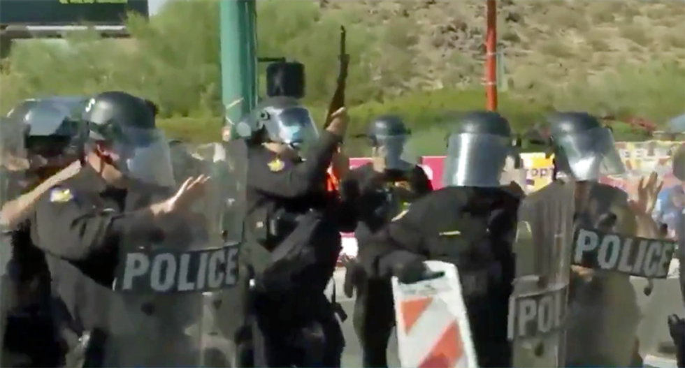 Police used pepper spray and flash-bang grenades on protesters outside Trump's controversial Phoenix rally: report