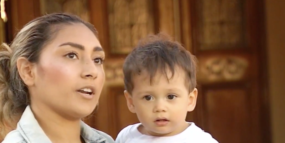 Woman coughs on a baby after hearing mother speak Spanish