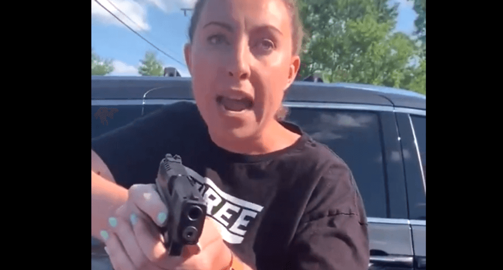White woman pulls gun on Black women in Chipotle parking lot feud