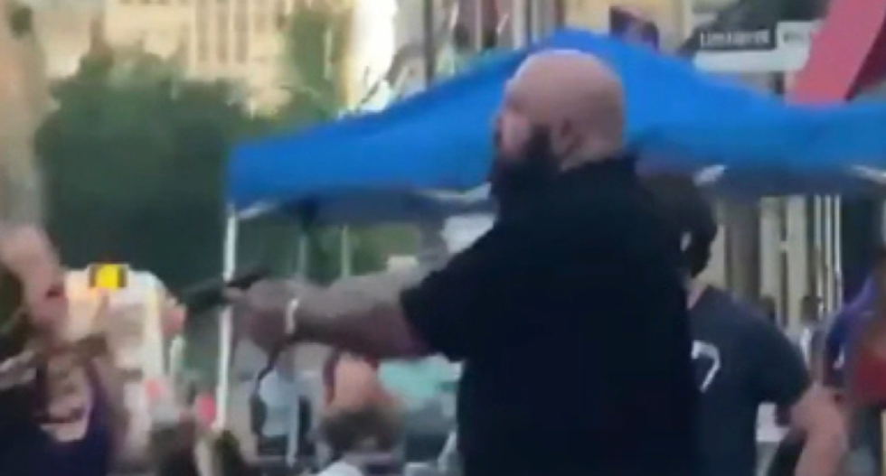 Trump supporter says ‘I’m the actual victim’ after pulling gun on Black man in mask dispute