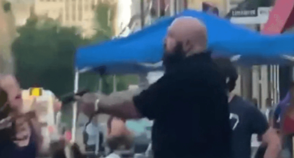Trump supporter says ‘I’m the actual victim’ after pulling gun on Black man in mask dispute