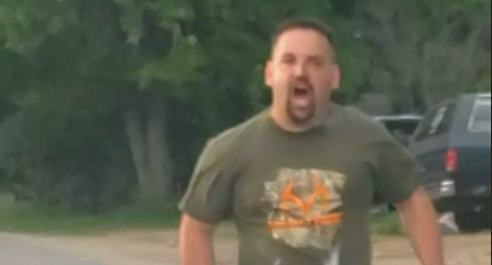 WATCH: Raging New York man screams racial slurs as he chases Black woman's car
