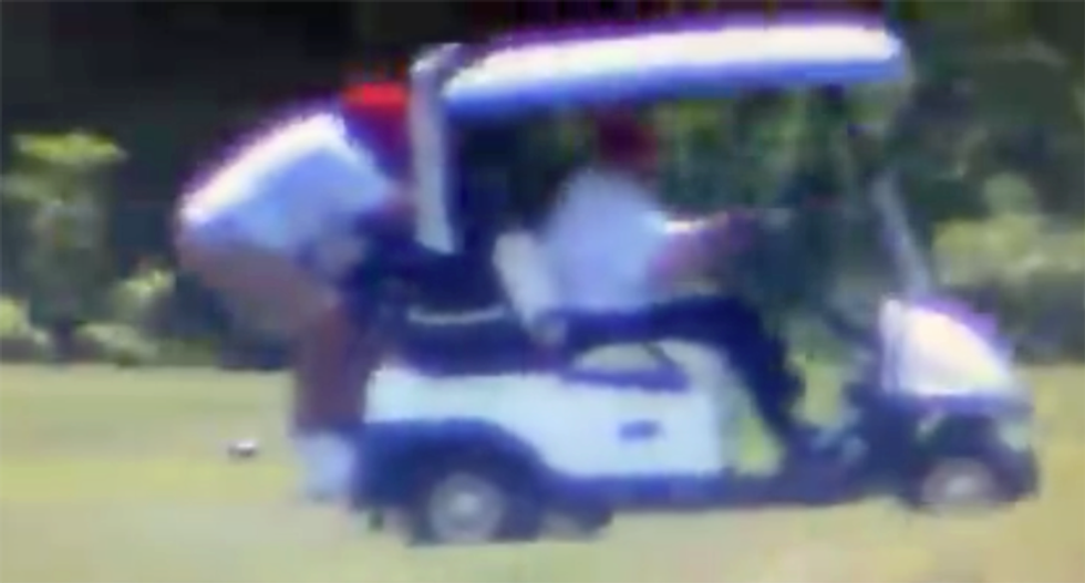 WATCH: Video shows how Trump makes his caddie hang on to the back of the golf cart